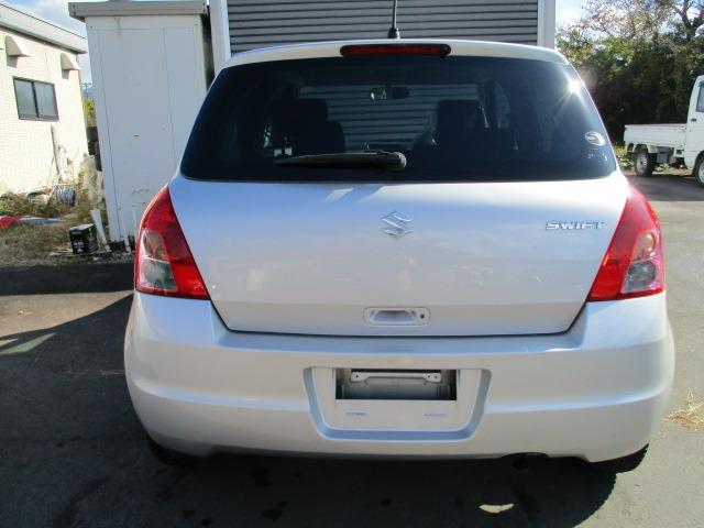 スイフト １．３ＸＧ　４ＷＤ　５速マニュアル　ナビ　ＣＤ／ＤＶＤ　オートエアコン　フロント左右シートヒーター　ワイパーデアイサー　ヒーテッドドアミラー　純正セキュリティ　スマートキー　キーフリー　１４インチＡＷ（44枚目）