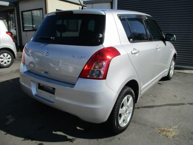 スイフト １．３ＸＧ　４ＷＤ　５速マニュアル　ナビ　ＣＤ／ＤＶＤ　オートエアコン　フロント左右シートヒーター　ワイパーデアイサー　ヒーテッドドアミラー　純正セキュリティ　スマートキー　キーフリー　１４インチＡＷ（45枚目）