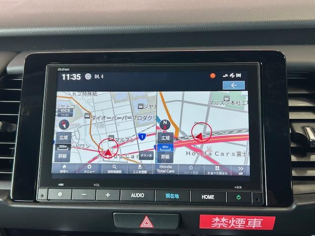 フィット ホーム　当社元レンタカーナビＢカメラＥＴＣフルセグＢｌｕｅｔｏｏｔｈ接続ＵＳＢ接続追突軽減ブレーキ電子パーキングオートブレーキホールドサイドカーテンエアバッグＬＥＤヘッドライトスマートキー２個禁煙車（2枚目）