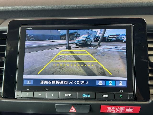 フィット ホーム　当社元レンタカーナビＢカメラＥＴＣフルセグＢｌｕｅｔｏｏｔｈ接続ＵＳＢ接続追突軽減ブレーキ電子パーキングオートブレーキホールドサイドカーテンエアバッグＬＥＤヘッドライトスマートキー２個禁煙車（3枚目）