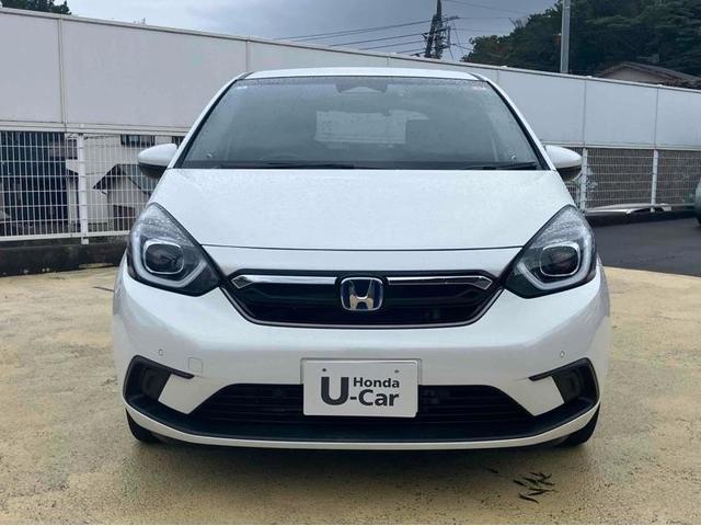 フィット ｅ：ＨＥＶホーム　ドライブレコーダー　ＥＴＣ　バックカメラ　ナビ　ＴＶ　クリアランスソナー　オートクルーズコントロール　レーンアシスト　衝突被害軽減システム　オートライト　ＬＥＤヘッドランプ　スマートキー（5枚目）