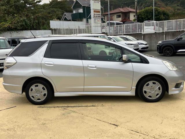 フィットシャトルハイブリッド ハイブリッド・スマートセレクション ハイブリッド ETC バックカメラ ナビ オートクルーズコントロール オートライト HID スマートキー アイドリングストップ 電動格納ミラー CVT 盗難防止システム(6枚目)