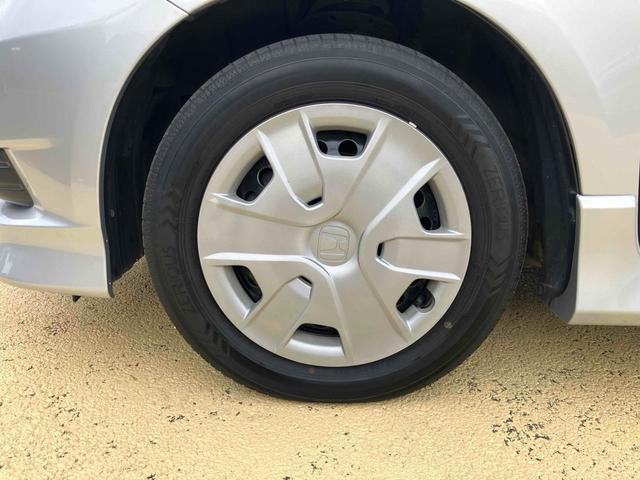 フィットシャトルハイブリッド ハイブリッド・スマートセレクション ハイブリッド ETC バックカメラ ナビ オートクルーズコントロール オートライト HID スマートキー アイドリングストップ 電動格納ミラー CVT 盗難防止システム(11枚目)