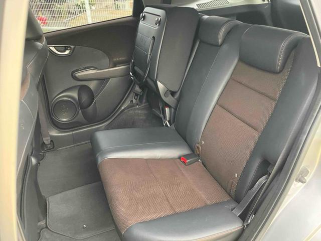 フィットシャトルハイブリッド ハイブリッド・スマートセレクション ハイブリッド ETC バックカメラ ナビ オートクルーズコントロール オートライト HID スマートキー アイドリングストップ 電動格納ミラー CVT 盗難防止システム(58枚目)