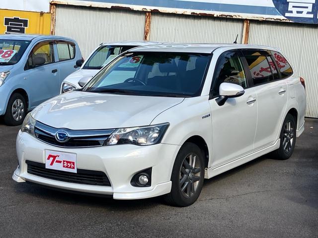 カローラフィールダー ハイブリッドＧ　エアロツアラー・ダブルバイビー　メモリーナビ　バックカメラ　Ｂｌｕｅｔｏｏｔｈ対応　フルセグＴＶ　スマートキー　スペアキー　プッシュスタート　ステアリングリモコン　純正エアロ　アルミホイール　ＨＩＤヘッドライト　電動格納ミラー（2枚目）