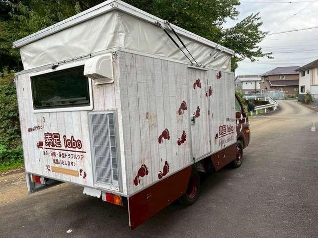 バネットトラック ロングスーパーローGL 2万K!CAT/エアコン/パワステ/パワーウィンドウ/Wタイヤ/ナビ/Bカメラ/ETC/ポップアップルーフ/出張作業/電動リクライニングチェア付/家庭用エアコン/照明/換気扇/外部電源接続/移動店舗(7枚目)