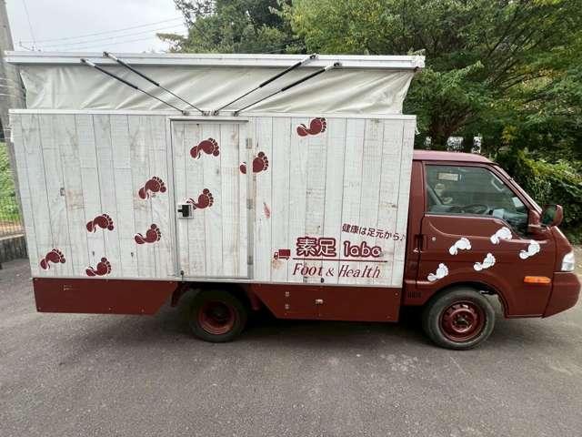 バネットトラック ロングスーパーローGL 2万K!CAT/エアコン/パワステ/パワーウィンドウ/Wタイヤ/ナビ/Bカメラ/ETC/ポップアップルーフ/出張作業/電動リクライニングチェア付/家庭用エアコン/照明/換気扇/外部電源接続/移動店舗(9枚目)