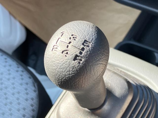 NT100クリッパートラック DX農繁仕様 4WD 5速マニュアル 届出済未使用車 デフロック 4枚スプリング 作業灯 社外ラバーマット/バイザー付き キーレスエントリー パワーウインド エアコン パワステ メーカー保証継承(19枚目)