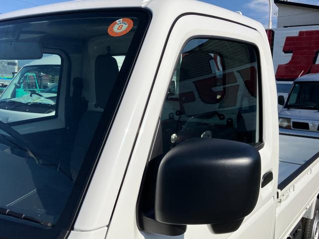 NT100クリッパートラック DX農繁仕様 4WD 5速マニュアル 届出済未使用車 デフロック 4枚スプリング 作業灯 社外ラバーマット/バイザー付き キーレスエントリー パワーウインド エアコン パワステ メーカー保証継承(23枚目)