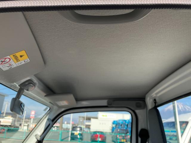 NT100クリッパートラック DX農繁仕様 4WD 5速マニュアル 届出済未使用車 デフロック 4枚スプリング 作業灯 社外ラバーマット/バイザー付き キーレスエントリー パワーウインド エアコン パワステ メーカー保証継承(28枚目)