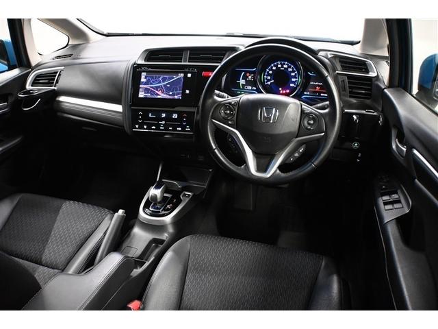 フィットハイブリッド Ｌパッケージ　フルセグ　メモリーナビ　ＤＶＤ再生　ミュージックプレイヤー接続可　バックカメラ　衝突被害軽減システム　ＥＴＣ　ＬＥＤヘッドランプ　社外アルミホイール（4枚目）