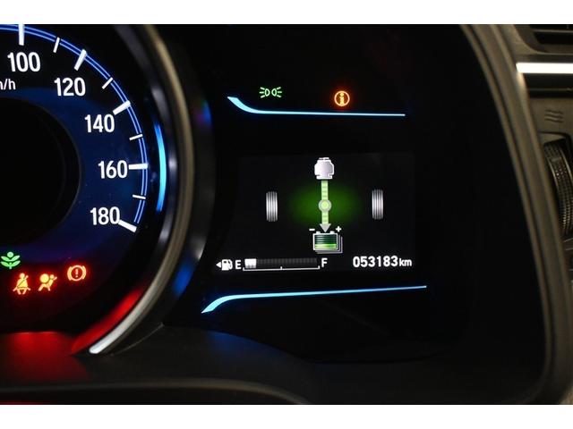 フィットハイブリッド Ｌパッケージ　フルセグ　メモリーナビ　ＤＶＤ再生　ミュージックプレイヤー接続可　バックカメラ　衝突被害軽減システム　ＥＴＣ　ＬＥＤヘッドランプ　社外アルミホイール（6枚目）