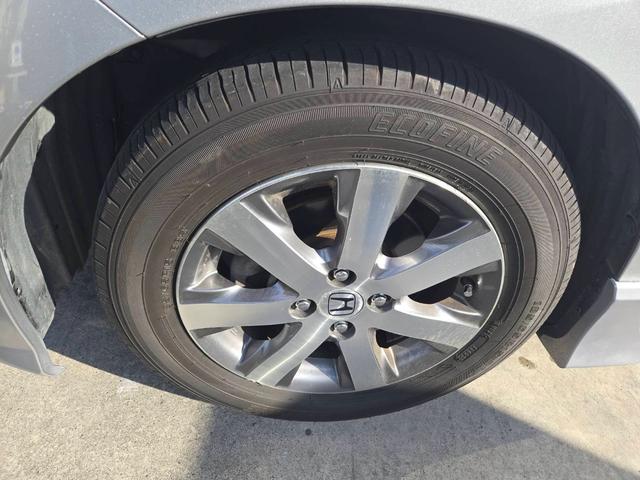 フリード フレックスｉ　エアロ　両側パワースライドドア　ナビ　フルセグＴＶ　バックカメラ　ＥＴＣ　電動格納ミラー　スマートキー　オートエアコン　ドアバイザー　アルミホイール　フリップダウンモニター（25枚目）