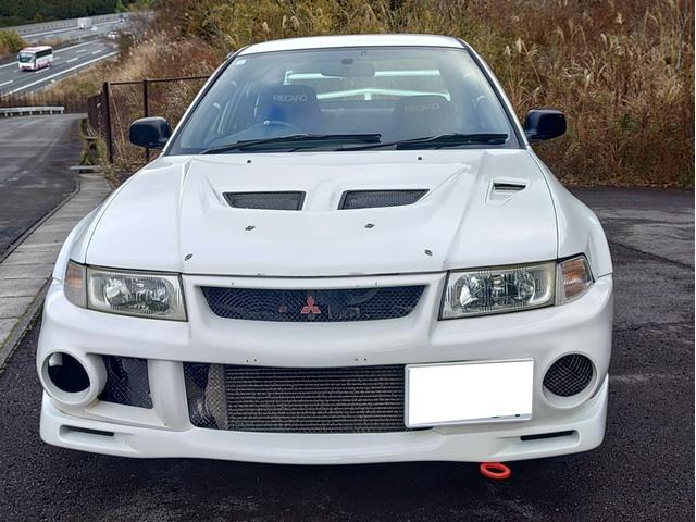 ランサー ＲＳエボリューションＶＩ　エアコン付　ダッシュ貫通９点式ロールゲージ　別タン式サスペンション　Ｆ・Ｃ・Ｒ機械式ＬＳＤ　ボディ補強　レカロ両脚　アドバンアルミホイル　新品シバタイヤ　吸排気チューン　フルガード　ナビ　ＥＴＣ（2枚目）