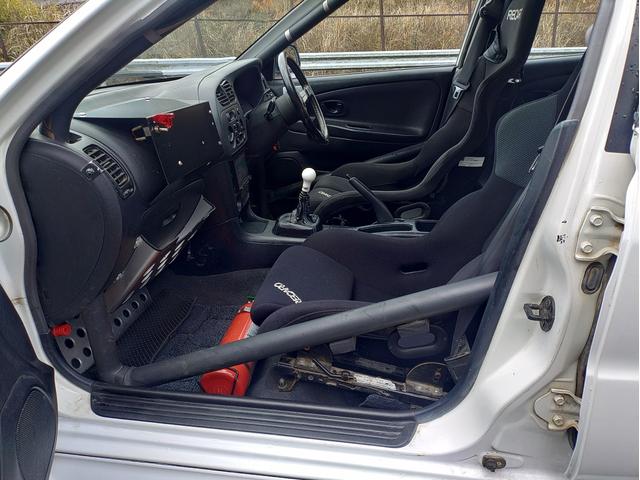 ランサー ＲＳエボリューションＶＩ　エアコン付　ダッシュ貫通９点式ロールゲージ　別タン式サスペンション　Ｆ・Ｃ・Ｒ機械式ＬＳＤ　ボディ補強　レカロ両脚　アドバンアルミホイル　新品シバタイヤ　吸排気チューン　フルガード　ナビ　ＥＴＣ（34枚目）