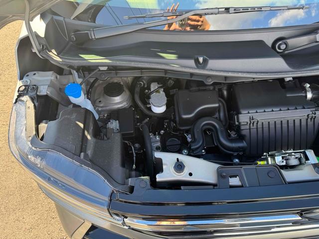 スペーシアカスタム 　両側電動スライドドア　オートクルーズコントロール　オートライト　スマートキー　アイドリングストップ　電動格納ミラー　シートヒーター　ＣＶＴ　アルミホイール　エアコン　パワーステアリング（24枚目）