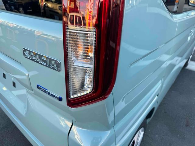 スペーシア ハイブリッドＸ　両側電動スライドドア　クリアランスソナー　オートライト　スマートキー　アイドリングストップ　電動格納ミラー　シートヒーター　ベンチシート　ＣＶＴ　盗難防止システム　ＡＢＳ　オットマン　エアコン（65枚目）