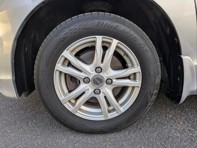 フリード Ｇ　ジャストセレクション　７人乗り／左側パワスラ／純正ナビ／キーレス／バックカメラ／ＥＴＣ／ステアリングリモコン／ＨＩＤライト／オートライト／本革巻きステアリング／タイミングチェーン／禁煙車／取説／保証書／スペアキー（51枚目）