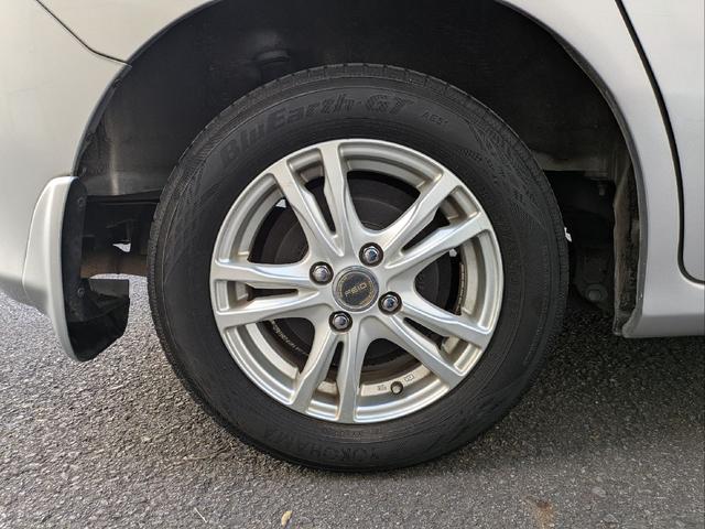 フリード Ｇ　ジャストセレクション　７人乗り／左側パワスラ／純正ナビ／キーレス／バックカメラ／ＥＴＣ／ステアリングリモコン／ＨＩＤライト／オートライト／本革巻きステアリング／タイミングチェーン／禁煙車／取説／保証書／スペアキー（55枚目）