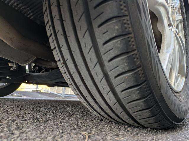 フリード Ｇ　ジャストセレクション　７人乗り／左側パワスラ／純正ナビ／キーレス／バックカメラ／ＥＴＣ／ステアリングリモコン／ＨＩＤライト／オートライト／本革巻きステアリング／タイミングチェーン／禁煙車／取説／保証書／スペアキー（56枚目）