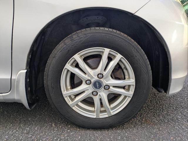 フリード Ｇ　ジャストセレクション　７人乗り／左側パワスラ／純正ナビ／キーレス／バックカメラ／ＥＴＣ／ステアリングリモコン／ＨＩＤライト／オートライト／本革巻きステアリング／タイミングチェーン／禁煙車／取説／保証書／スペアキー（57枚目）