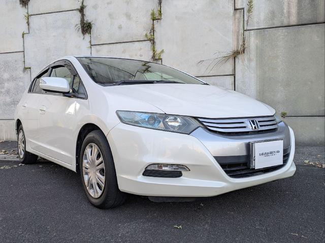 インサイト Ｌ　車検令和９年７月／タイヤ４本新品交換／キーレス／純正ＨＤＤナビ／ＨＩＤライト／バックカメラ／ＥＴＣ／本革巻きステアリング／ステアリモコン／タイミングチェーン／禁煙車／取説／スペアキー／保証書／記録簿／（6枚目）