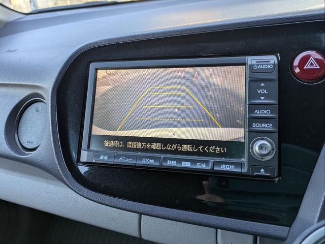 インサイト Ｌ　車検令和９年７月／タイヤ４本新品交換／キーレス／純正ＨＤＤナビ／ＨＩＤライト／バックカメラ／ＥＴＣ／本革巻きステアリング／ステアリモコン／タイミングチェーン／禁煙車／取説／スペアキー／保証書／記録簿／（21枚目）