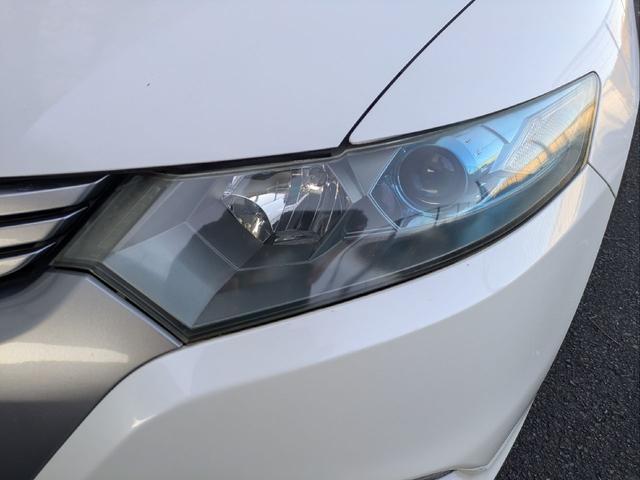 インサイト Ｌ　車検令和９年７月／タイヤ４本新品交換／キーレス／純正ＨＤＤナビ／ＨＩＤライト／バックカメラ／ＥＴＣ／本革巻きステアリング／ステアリモコン／タイミングチェーン／禁煙車／取説／スペアキー／保証書／記録簿／（55枚目）