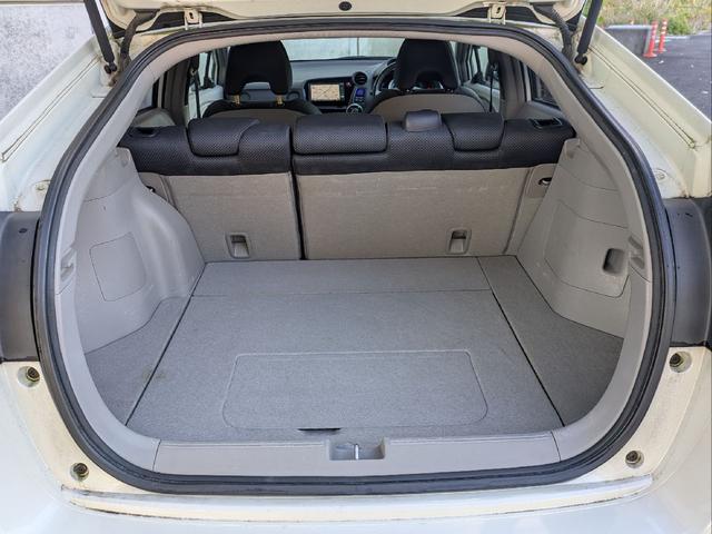 インサイト Ｌ　車検令和９年７月／タイヤ４本新品交換／キーレス／純正ＨＤＤナビ／ＨＩＤライト／バックカメラ／ＥＴＣ／本革巻きステアリング／ステアリモコン／タイミングチェーン／禁煙車／取説／スペアキー／保証書／記録簿／（57枚目）