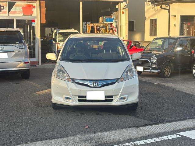 フィットハイブリッド ナビプレミアムセレクション　パナソニックナビ（純正ナビなし）／マルチコートフォグランプ／オプションイルミネーションスカッフプレート／シートヒーター／クルーズコントロール（2枚目）