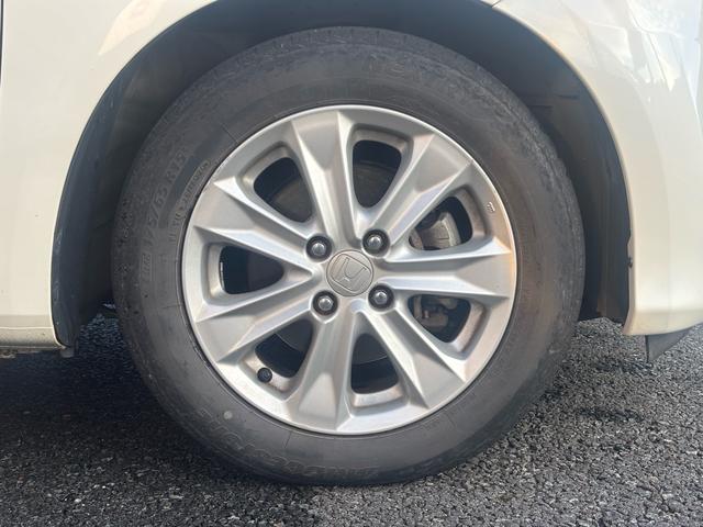 フィットハイブリッド ナビプレミアムセレクション　パナソニックナビ（純正ナビなし）／マルチコートフォグランプ／オプションイルミネーションスカッフプレート／シートヒーター／クルーズコントロール（11枚目）