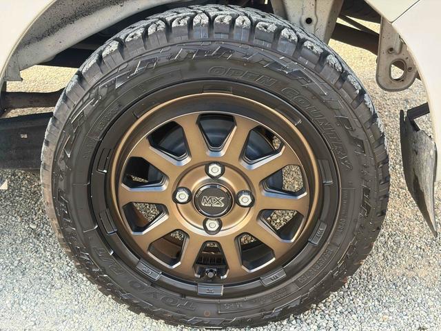 NV100クリッパーバン DX GLパッケージ 4WD 5速マニュアル クラッチ新品 マッドクロス14インチアルミ+オープンカントリーR/T ETC 両側スライドドア パワーウインド エアコン パワステ(19枚目)