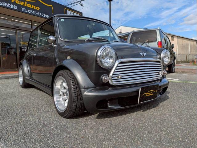 ＭＩＮＩ １．３　全塗装　社外エアクリ・マフラー・１３ＡＷ　オーバーフェンダー　追加メーター　ローダウン　シートカバー　ＥＴＣ　オルタネーター交換済み　ユーザー買取車禁煙車　社外スピーカー　社外エアロ（3枚目）