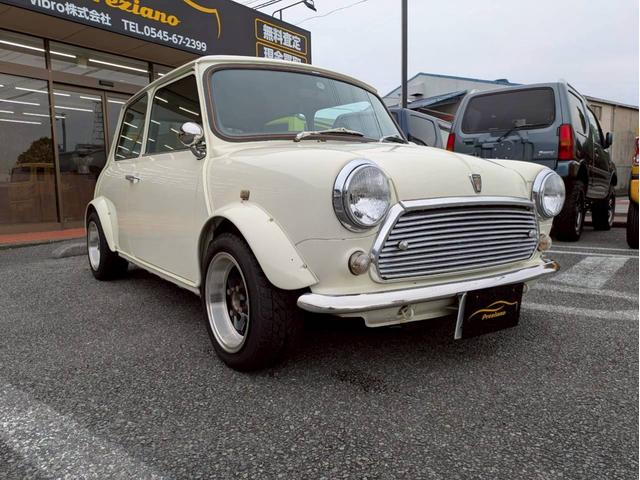 ＭＩＮＩ １．３　レザーシート　オーバーフェンダー　社外１２インチホイール　社外センター出しマフラー　ローダウン　ＥＴＣ　ユーザー買取　全塗装　禁煙車（3枚目）