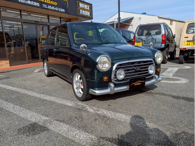 ミラジーノ ミニライトスペシャルターボ　社外ナビ　ＨＩＤヘッドライト　ローダウン　５速ミッション　社外スピーカー　ウッドコンビハンドル　フェンダーミラー　シートカバー　前後ドライブレコーダー　ＥＴＣ　ユーザー買取車　禁煙車（3枚目）