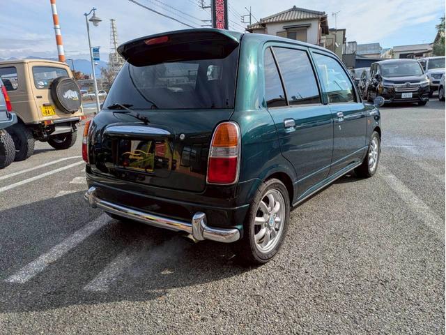 ミラジーノ ミニライトスペシャルターボ　社外ナビ　ＨＩＤヘッドライト　ローダウン　５速ミッション　社外スピーカー　ウッドコンビハンドル　フェンダーミラー　シートカバー　前後ドライブレコーダー　ＥＴＣ　ユーザー買取車　禁煙車（5枚目）