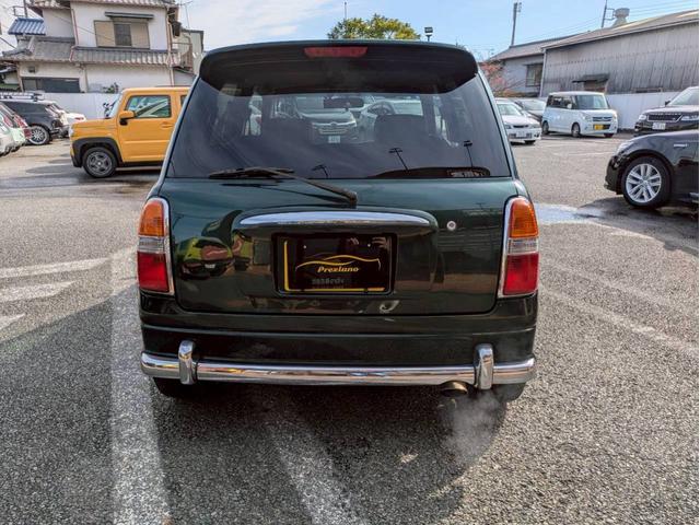 ミラジーノ ミニライトスペシャルターボ　社外ナビ　ＨＩＤヘッドライト　ローダウン　５速ミッション　社外スピーカー　ウッドコンビハンドル　フェンダーミラー　シートカバー　前後ドライブレコーダー　ＥＴＣ　ユーザー買取車　禁煙車（6枚目）