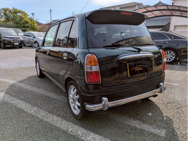 ミラジーノ ミニライトスペシャルターボ　社外ナビ　ＨＩＤヘッドライト　ローダウン　５速ミッション　社外スピーカー　ウッドコンビハンドル　フェンダーミラー　シートカバー　前後ドライブレコーダー　ＥＴＣ　ユーザー買取車　禁煙車（7枚目）