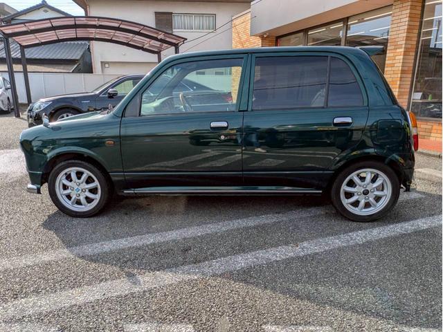 ミラジーノ ミニライトスペシャルターボ　社外ナビ　ＨＩＤヘッドライト　ローダウン　５速ミッション　社外スピーカー　ウッドコンビハンドル　フェンダーミラー　シートカバー　前後ドライブレコーダー　ＥＴＣ　ユーザー買取車　禁煙車（8枚目）