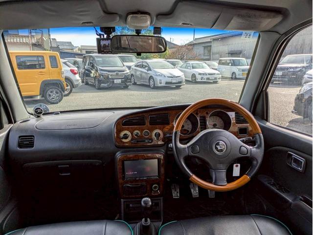 ミラジーノ ミニライトスペシャルターボ　社外ナビ　ＨＩＤヘッドライト　ローダウン　５速ミッション　社外スピーカー　ウッドコンビハンドル　フェンダーミラー　シートカバー　前後ドライブレコーダー　ＥＴＣ　ユーザー買取車　禁煙車（10枚目）