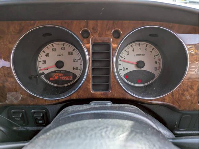 ミラジーノ ミニライトスペシャルターボ　社外ナビ　ＨＩＤヘッドライト　ローダウン　５速ミッション　社外スピーカー　ウッドコンビハンドル　フェンダーミラー　シートカバー　前後ドライブレコーダー　ＥＴＣ　ユーザー買取車　禁煙車（21枚目）
