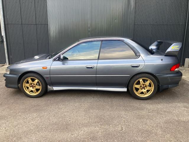インプレッサ ＷＲＸ　ＳＴｉバージョンＶ　ターボ　４ＷＤ　ＨＤＤナビ　ＢＬＵＴＯＯＴＨ　ＭＯＭＯステアリング　フォグランプ　ＥＴＣ　ドライブレコーダーＳＰＥＥＤ　ＬＩＮＥ　１６インチアルミホイール　柿本マフラー（9枚目）