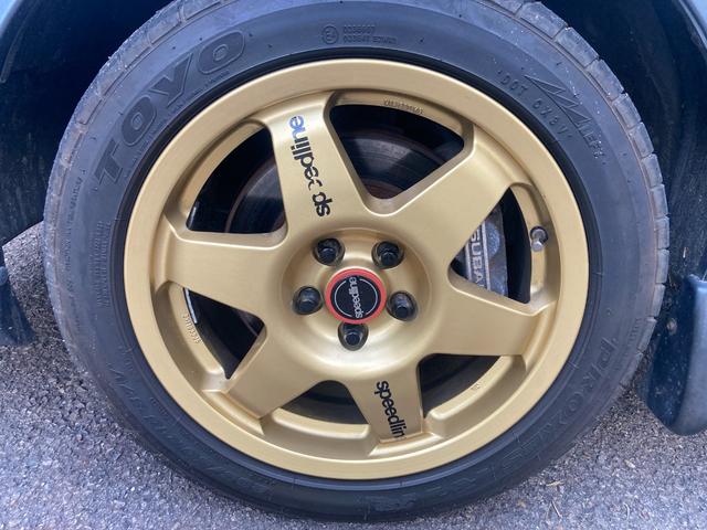 インプレッサ ＷＲＸ　ＳＴｉバージョンＶ　ターボ　４ＷＤ　ＨＤＤナビ　ＢＬＵＴＯＯＴＨ　ＭＯＭＯステアリング　フォグランプ　ＥＴＣ　ドライブレコーダーＳＰＥＥＤ　ＬＩＮＥ　１６インチアルミホイール　柿本マフラー（10枚目）