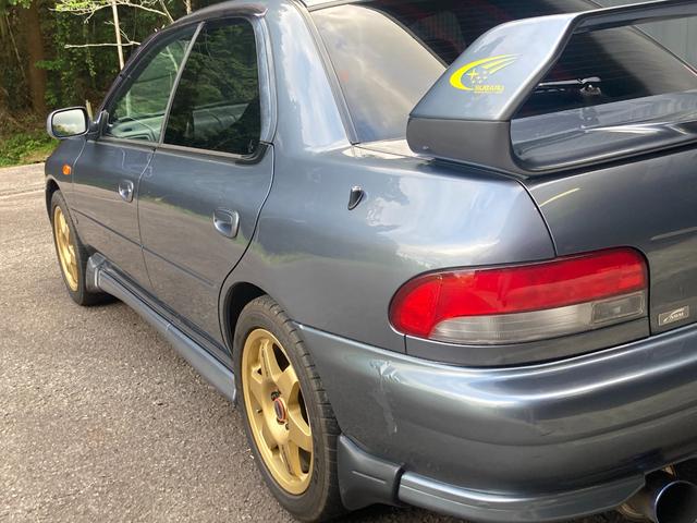 インプレッサ ＷＲＸ　ＳＴｉバージョンＶ　ターボ　４ＷＤ　ＨＤＤナビ　ＢＬＵＴＯＯＴＨ　ＭＯＭＯステアリング　フォグランプ　ＥＴＣ　ドライブレコーダーＳＰＥＥＤ　ＬＩＮＥ　１６インチアルミホイール　柿本マフラー（16枚目）