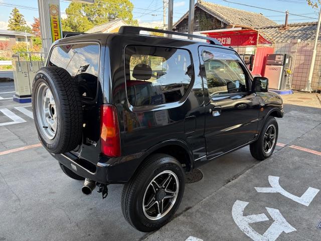 ジムニー ワイルドウインド　リフトアップ　４ＷＤ　前後ドライブレコーダー　Ｂｌｕｅｔｏｏｔｈ接続　社外マフラー　ナビ　ＴＶ　キーレスエントリー　電動格納ミラー　シートヒーター　ＭＴ　ルーフレール　アルミホイール　衝突安全ボディ（15枚目）