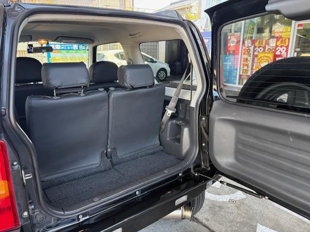 ジムニー ワイルドウインド　リフトアップ　４ＷＤ　前後ドライブレコーダー　Ｂｌｕｅｔｏｏｔｈ接続　社外マフラー　ナビ　ＴＶ　キーレスエントリー　電動格納ミラー　シートヒーター　ＭＴ　ルーフレール　アルミホイール　衝突安全ボディ（35枚目）