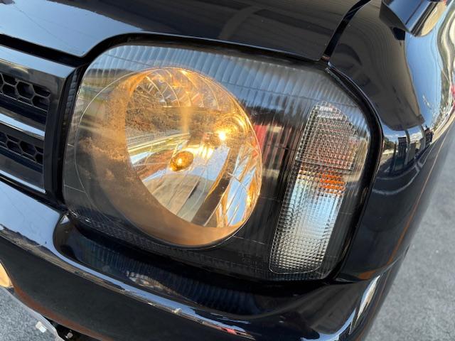 ジムニー ワイルドウインド　リフトアップ　４ＷＤ　前後ドライブレコーダー　Ｂｌｕｅｔｏｏｔｈ接続　社外マフラー　ナビ　ＴＶ　キーレスエントリー　電動格納ミラー　シートヒーター　ＭＴ　ルーフレール　アルミホイール　衝突安全ボディ（52枚目）