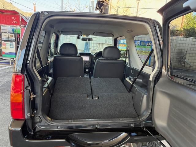 ジムニー クロスアドベンチャーＸＣ　リフトアップ　社外マフラー　４ＷＤ　ドライブレコーダー　ＥＴＣ　ナビ　キーレスエントリー　電動格納ミラー　シートヒーター　ＡＴ　ＡＢＳ　アルミホイール　衝突安全ボディ　ＡＣ　ＰＳ　ＰＷ　ターボ車（19枚目）