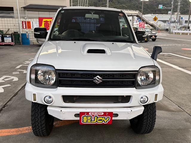 ジムニー ＸＧ　リフトアップ　Ｂｌｕｅｔｏｏｔｈ接続　社外マフラー　４ＷＤ　ドライブレコーダー　キーレスエントリー　電動格納ミラー　ＭＴ　ＡＢＳ　社外アルミホイール　衝突安全ボディ　エアコン　パワーウィンドウ（12枚目）
