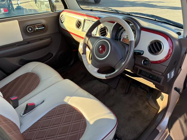 アルトラパンショコラ Ｇ　社外ナビ　地デジＴＶ　Ｂカメラ　エアバッグ　パワステ　ＡＢＳ　レザーシート　スマートキー　Ｐスタート　オートエアコン（10枚目）